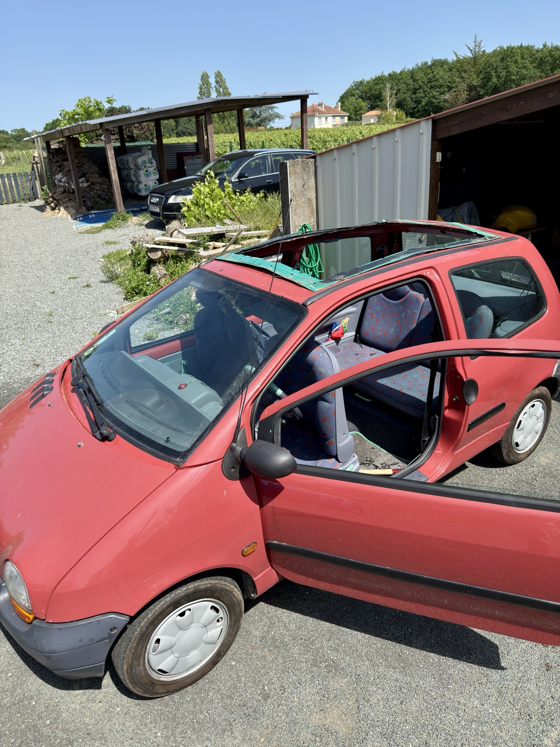 Découpe du pavillon d'une Twingo pour pose Open Air